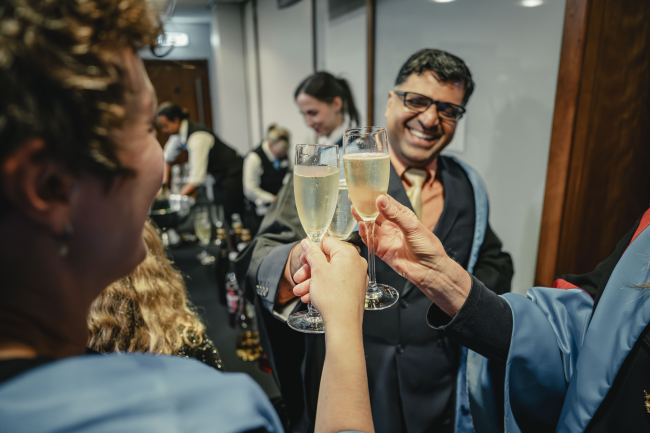 People smiling with drinks